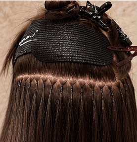 Keratin-bond hair extensions fitted at the root