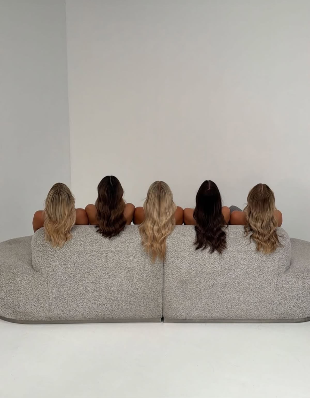A collection of styled hair extension results